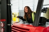Lineage employee in a forklift